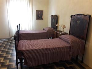 La Mascarella tesisinde bir odada yatak veya yataklar