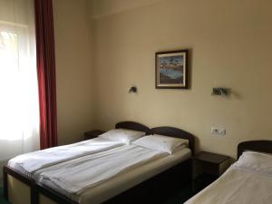 Postel nebo postele na pokoji v ubytování Motel Kilometrul Zero + 4 fotografie