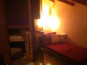 Tempat tidur dalam kamar di Hotel Soliva