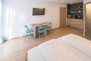 Kuchyň nebo kuchyňský kout v ubytování Pension Breitenauer See + 50 fotografií