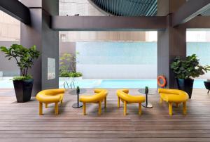 Posezení v ubytování Pan Pacific Serviced Suites Orchard, Singapore
