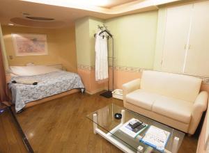 Postel nebo postele na pokoji v ubytování Hotel Mju-Adult Only