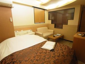 Postel nebo postele na pokoji v ubytování Hotel Mju-Adult Only