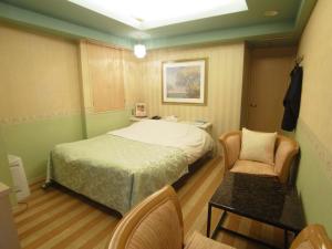 Postel nebo postele na pokoji v ubytování Hotel Mju-Adult Only