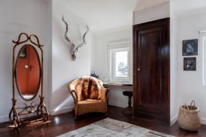 Posezení v ubytování Une Chambre Chez Dupont
