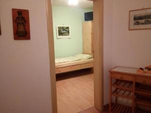 Postel nebo postele na pokoji v ubytování Pension "Am Tor zum Mainbogen" + 2 fotografie