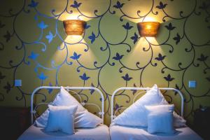 Postel nebo postele na pokoji v ubytování Hotel Alexander + 37 fotografií