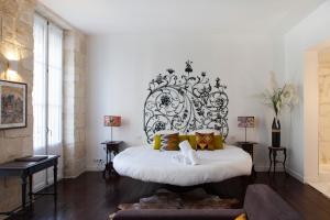 Postel nebo postele na pokoji v ubytování Une Chambre Chez Dupont
