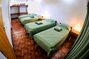 Giường trong phòng chung tại El Manantial de Iguazu