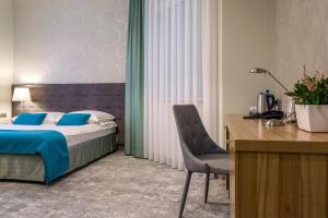 Posteľ alebo postele v izbe v ubytovaní Tulip Hotels - Wroclaw Patio
