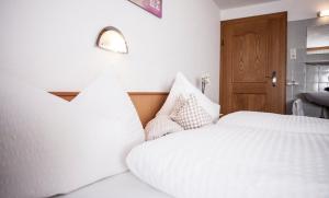 A bed or beds in a room at Apart Peter