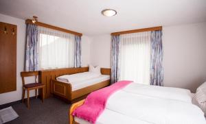 A bed or beds in a room at Apart Peter