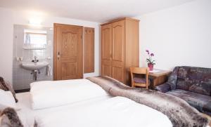 A bed or beds in a room at Apart Peter