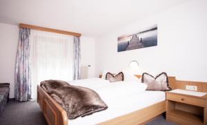 A bed or beds in a room at Apart Peter