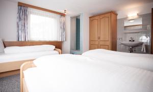 A bed or beds in a room at Apart Peter