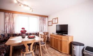 A television and/or entertainment centre at Apart Peter