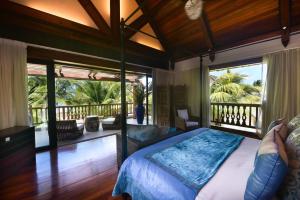 Ένα ή περισσότερα κρεβάτια σε δωμάτιο στο Sankhara Luxury Private Beach Villas +54 φωτογραφίες