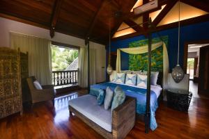 O zonă de relaxare la Sankhara Private Beach Luxury Villas