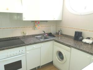 Kuchnia lub aneks kuchenny w obiekcie Apartamento Ossuna