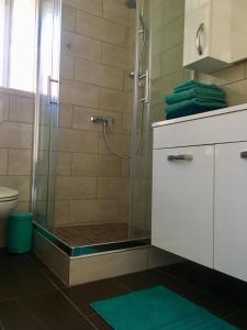 Koupelna v ubytování Appartement Douces heures avec parking couvert privé