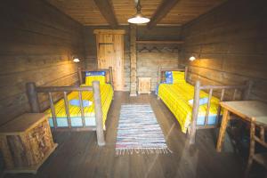
Voodi või voodid majutusasutuse Suure Töllu Puhkeküla toas
