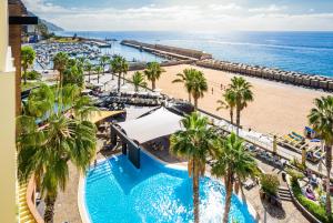 an aerial view of a resort with a pool and a beach at Calheta Beach - All-inclusive - Savoy Signature in Calheta