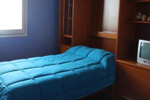 Posteľ alebo postele v izbe v ubytovaní Apartamento Mendi