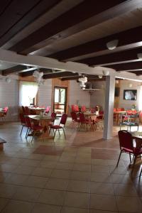 Restaurace v ubytování Gosciniec Uzmauda + 26 fotografií