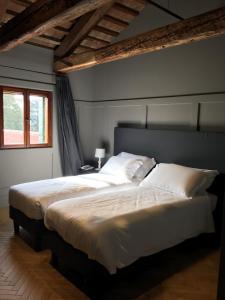 Postel nebo postele na pokoji v ubytování Hotel 5 Colonne