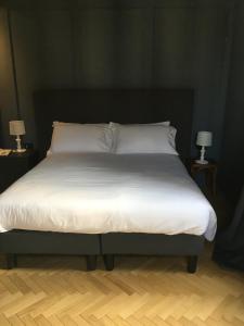 Postel nebo postele na pokoji v ubytování Hotel 5 Colonne