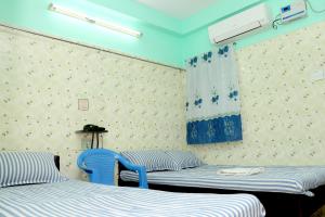 Postel nebo postele na pokoji v ubytování SIU Mansion