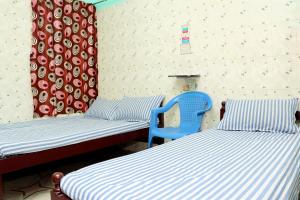Postel nebo postele na pokoji v ubytování SIU Mansion