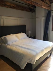Postel nebo postele na pokoji v ubytování Hotel 5 Colonne
