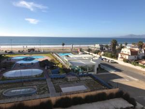 a view of the beach and a resort at Apartamento en Club Oceano in Coquimbo