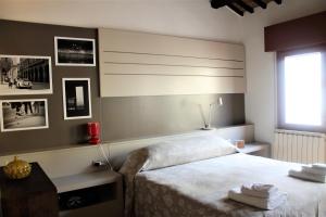Postel nebo postele na pokoji v ubytování Appartamento Via Mazzini