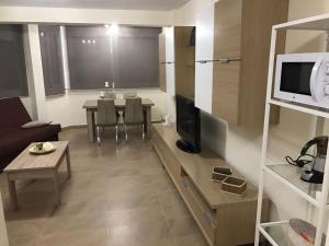 Telewizja i/lub zestaw kina domowego w obiekcie Estudio Torre del Mar