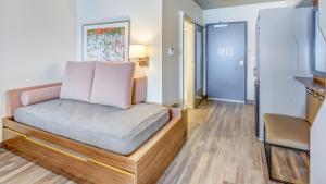 a living room with a couch and a chair at Holiday Inn & Suites Bellingham, an IHG Hotel in Bellingham