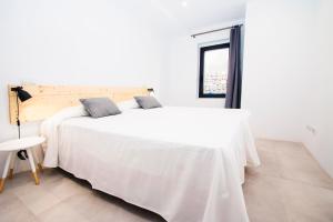 A bed or beds in a room at Casesambaire