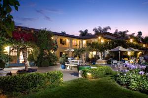 a house with a garden at night at The Milo in Santa Barbara