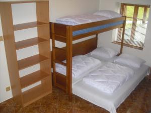 Posteľ alebo postele v izbe v ubytovaní Privat SKI Erlebach