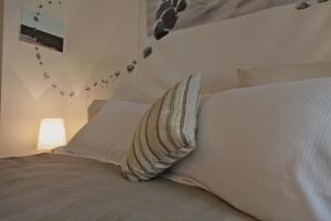 A bed or beds in a room at Maison Bondaz & SPA privé