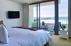 
a hotel room with a view of the ocean at Tower 23 Hotel in San Diego
