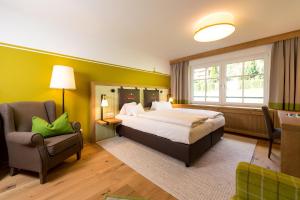 Postel nebo postele na pokoji v ubytování Berg-Spa & Hotel Zamangspitze