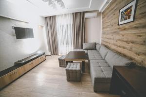 TV in/ali zabaviščno središče v nastanitvi Lumarc Hotel