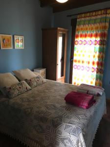 Postel nebo postele na pokoji v ubytování Casa Rural Magdalena