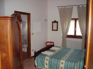 Voodi või voodid majutusasutuse Prati dei Campassi toas