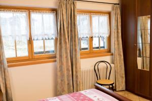 Posteľ alebo postele v izbe v ubytovaní Chalet Aurora
