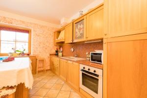 Kuchyňa alebo kuchynka v ubytovaní Chalet Aurora