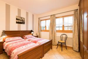 Posteľ alebo postele v izbe v ubytovaní Chalet Aurora