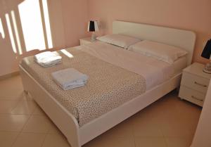 Cama o camas de una habitación en Beach Apartments ERA